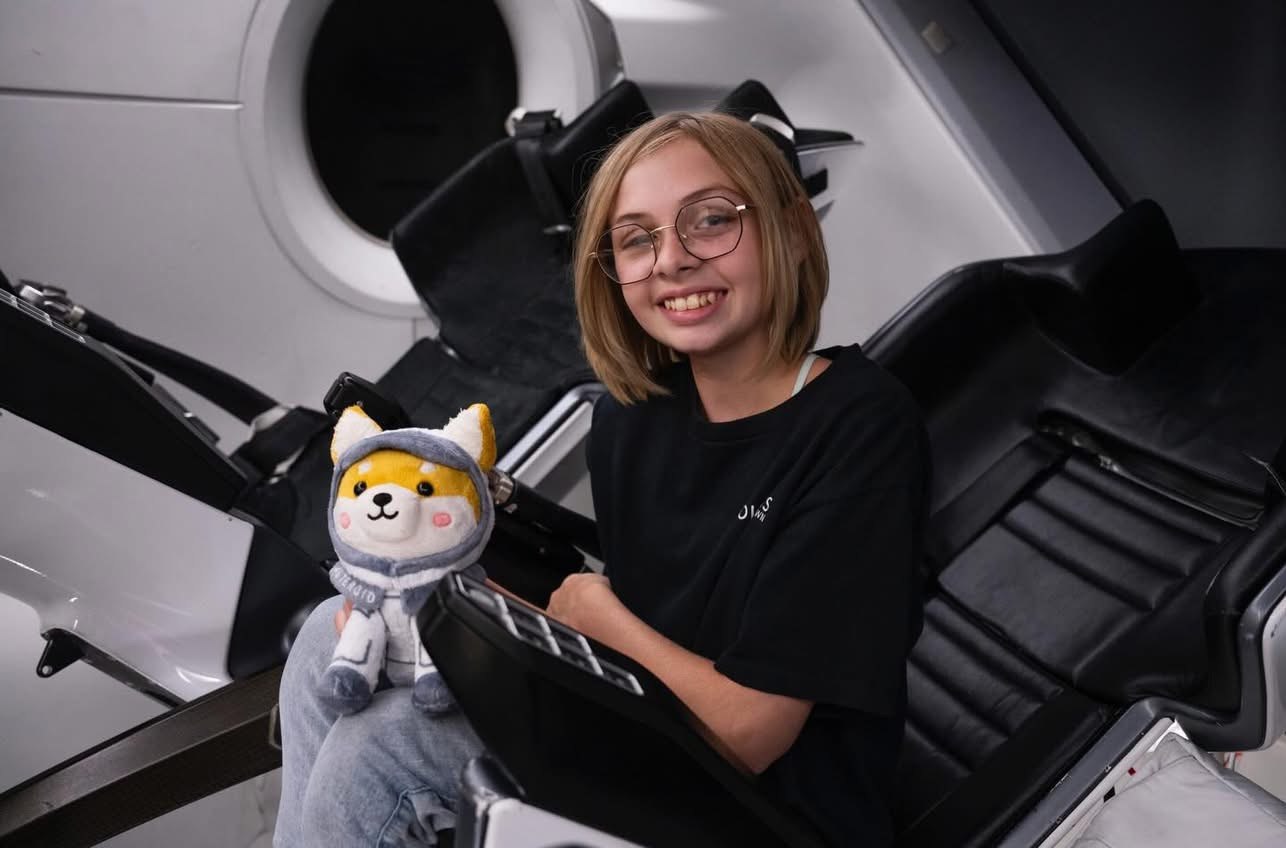 Liv Perrotto holding ASTEROID plush